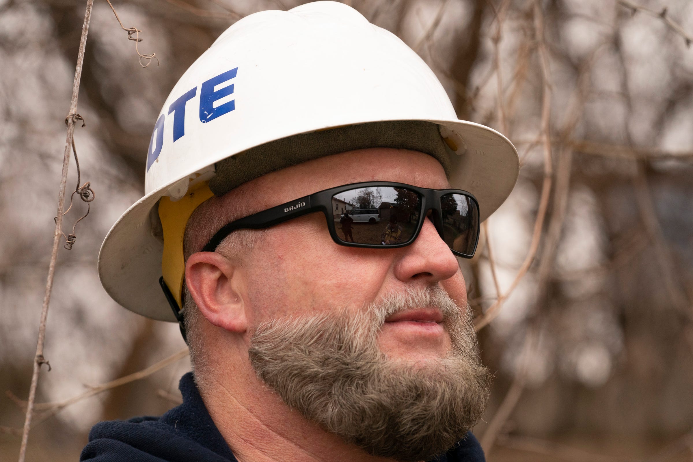 DTE line worker Seth Hartwick, of Belleville, in the field on Tuesday, Feb. 28, 2023.